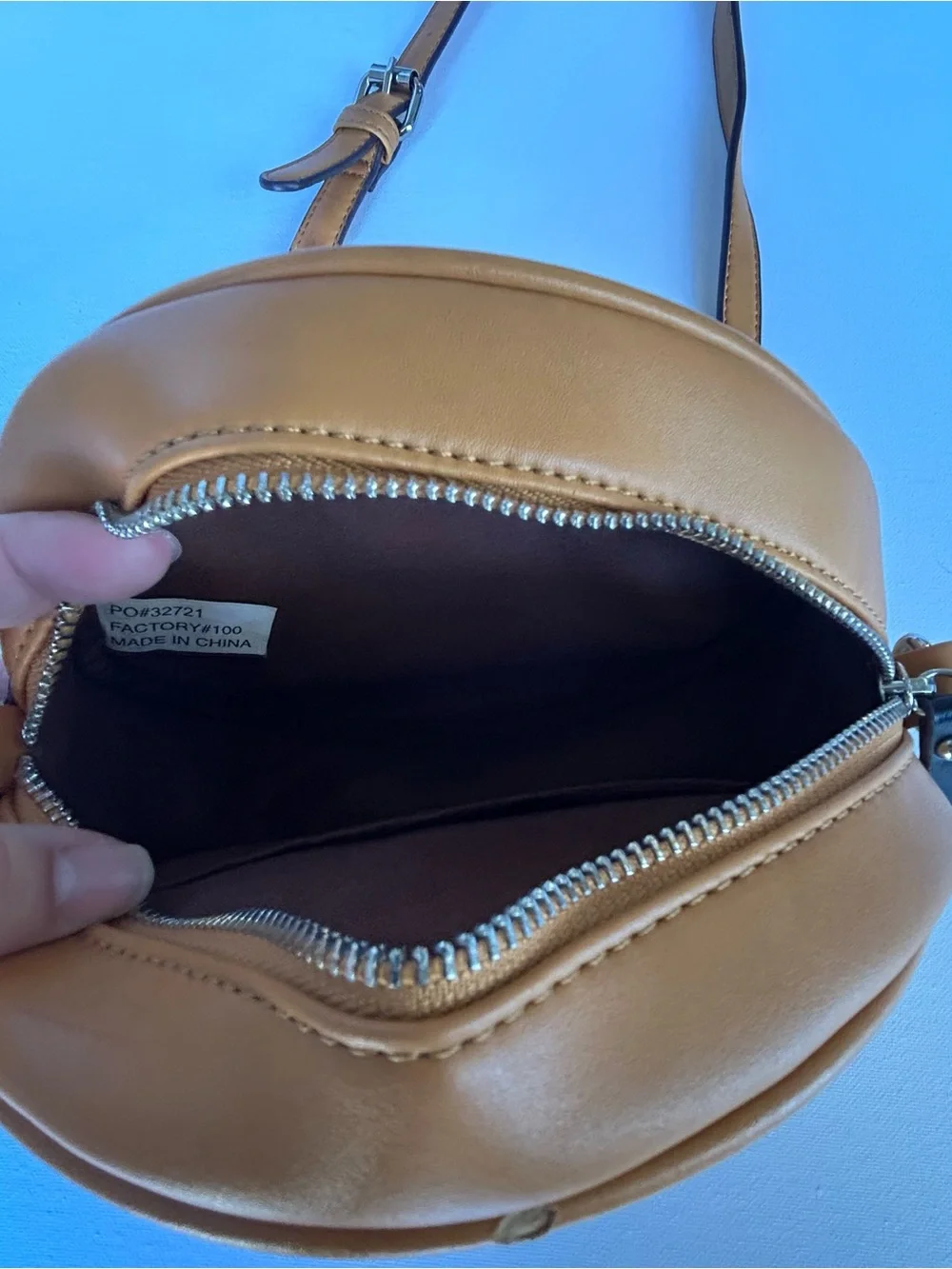 Adrienne Vittadini Round Quilted Crossbody Bag in Tan